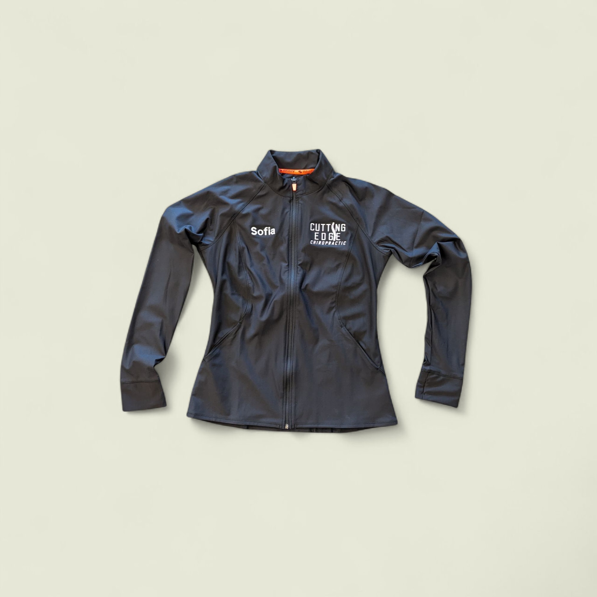 Jacket custom embroidered with the Cutting Edge Chiropractic logo