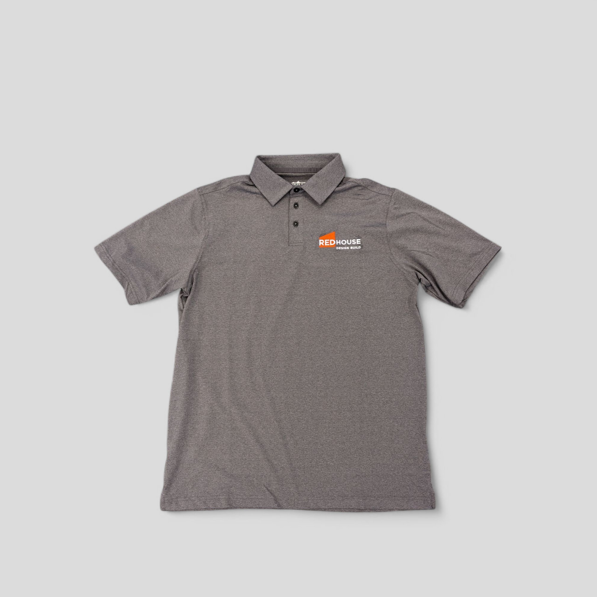 Polo shirt custom embroidered with the RedHouse Design Build logo