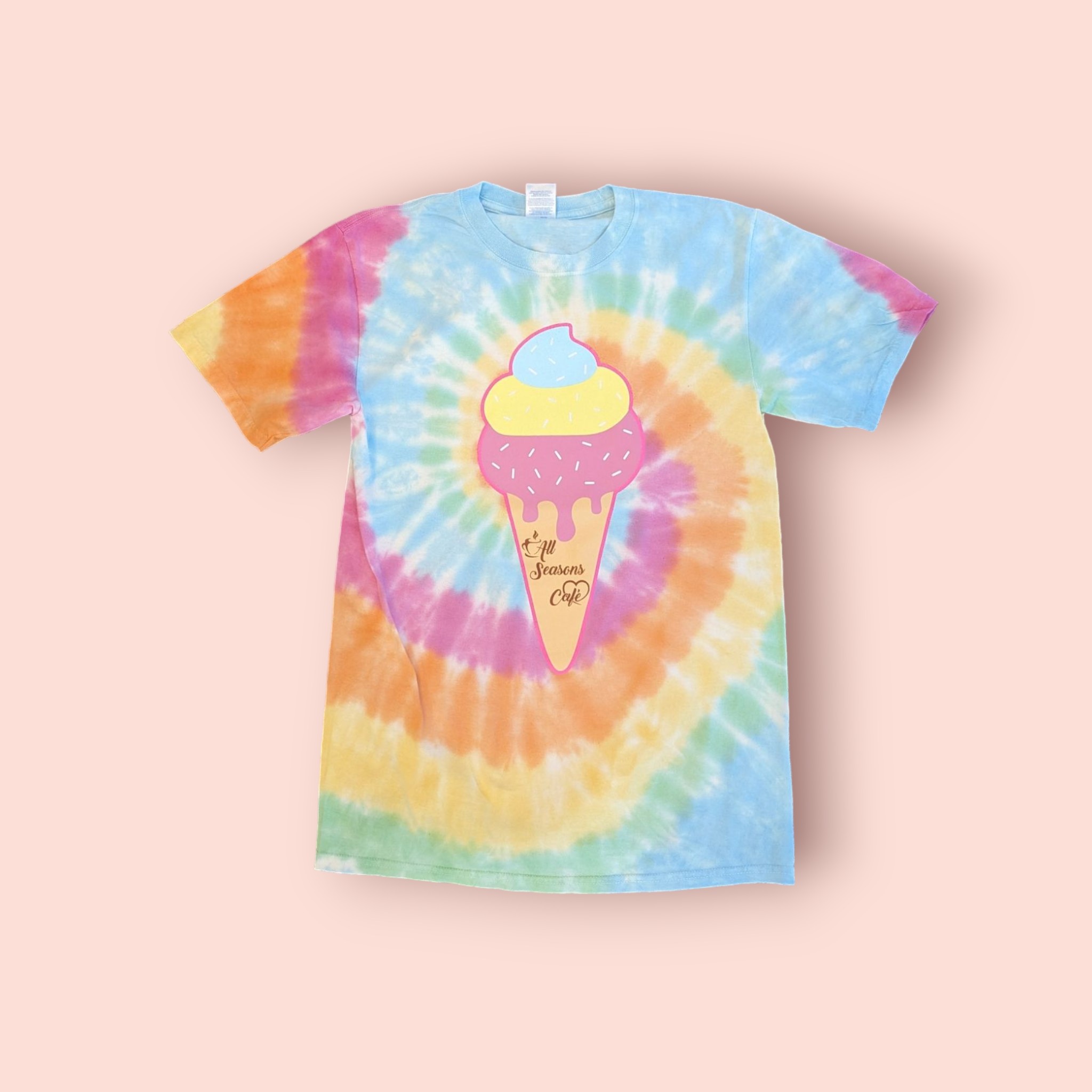 Tie-dye t-shirt screen printed with the All Seasons Café logo